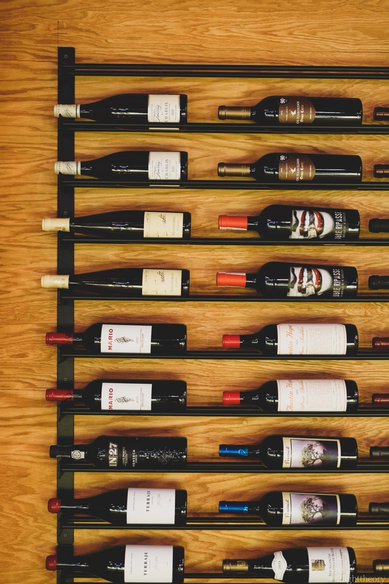 The wine rack on the lounge wall